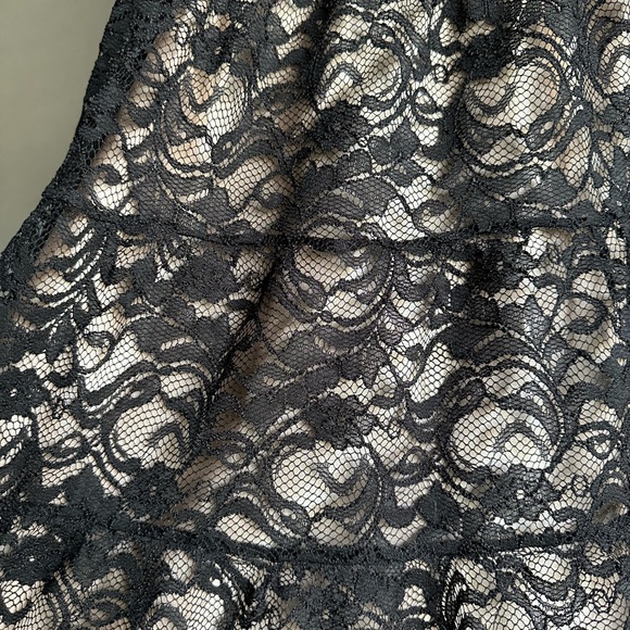 SUPER comfortable, classy black and lace dress. Gold underneath - Picture 9 of 9